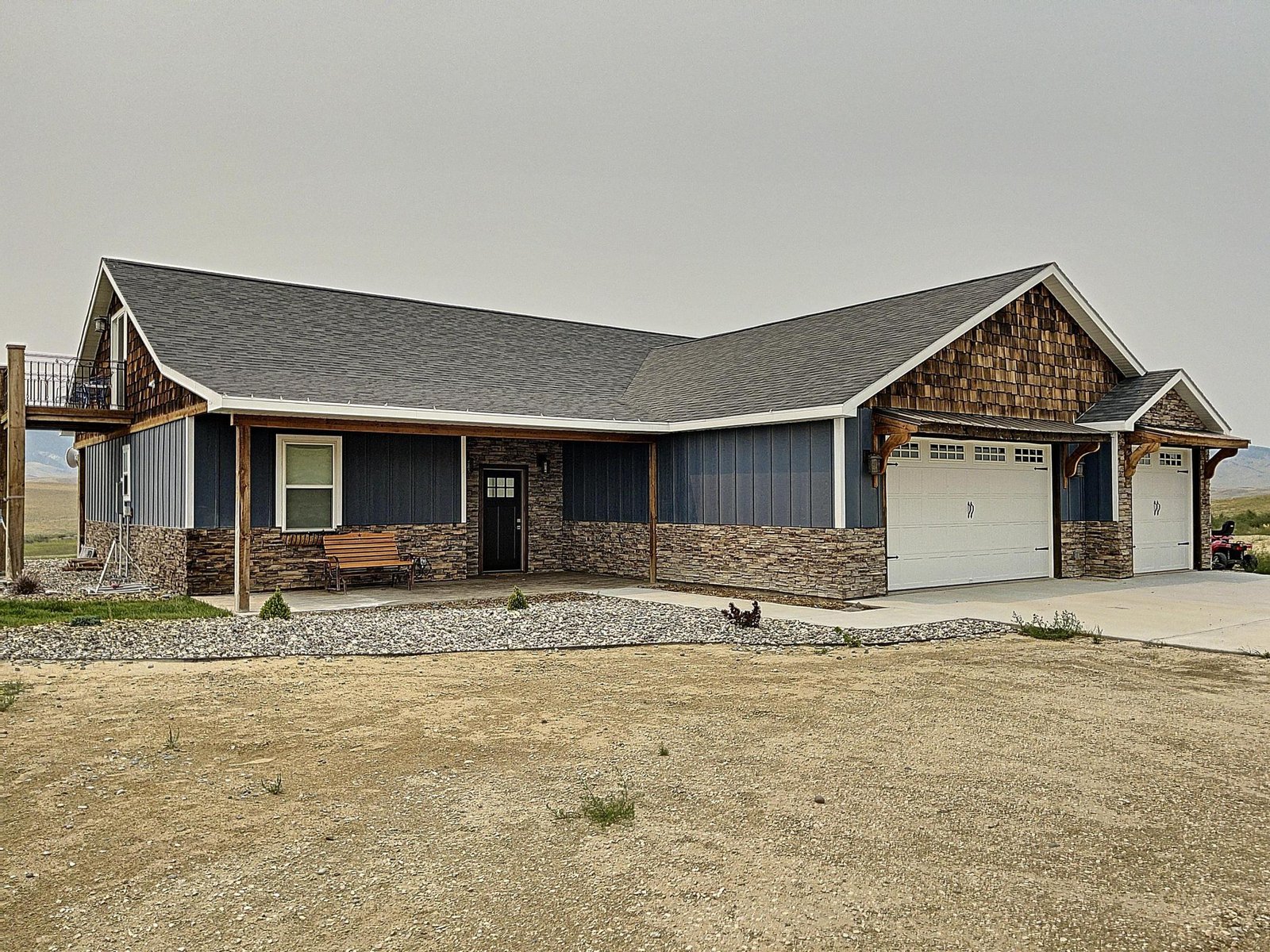 A stone and timber spec home built by Greenhouse Construction near Buffalo, Wyoming